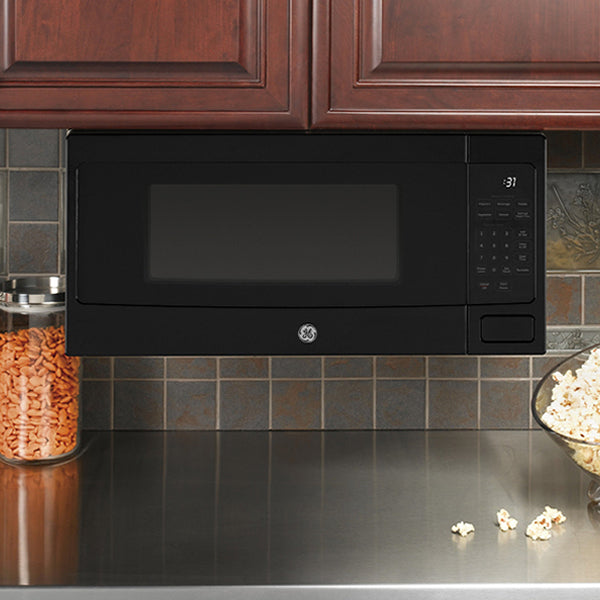 Profile 1.10 Cubic Feet Countertop Microwave Oven