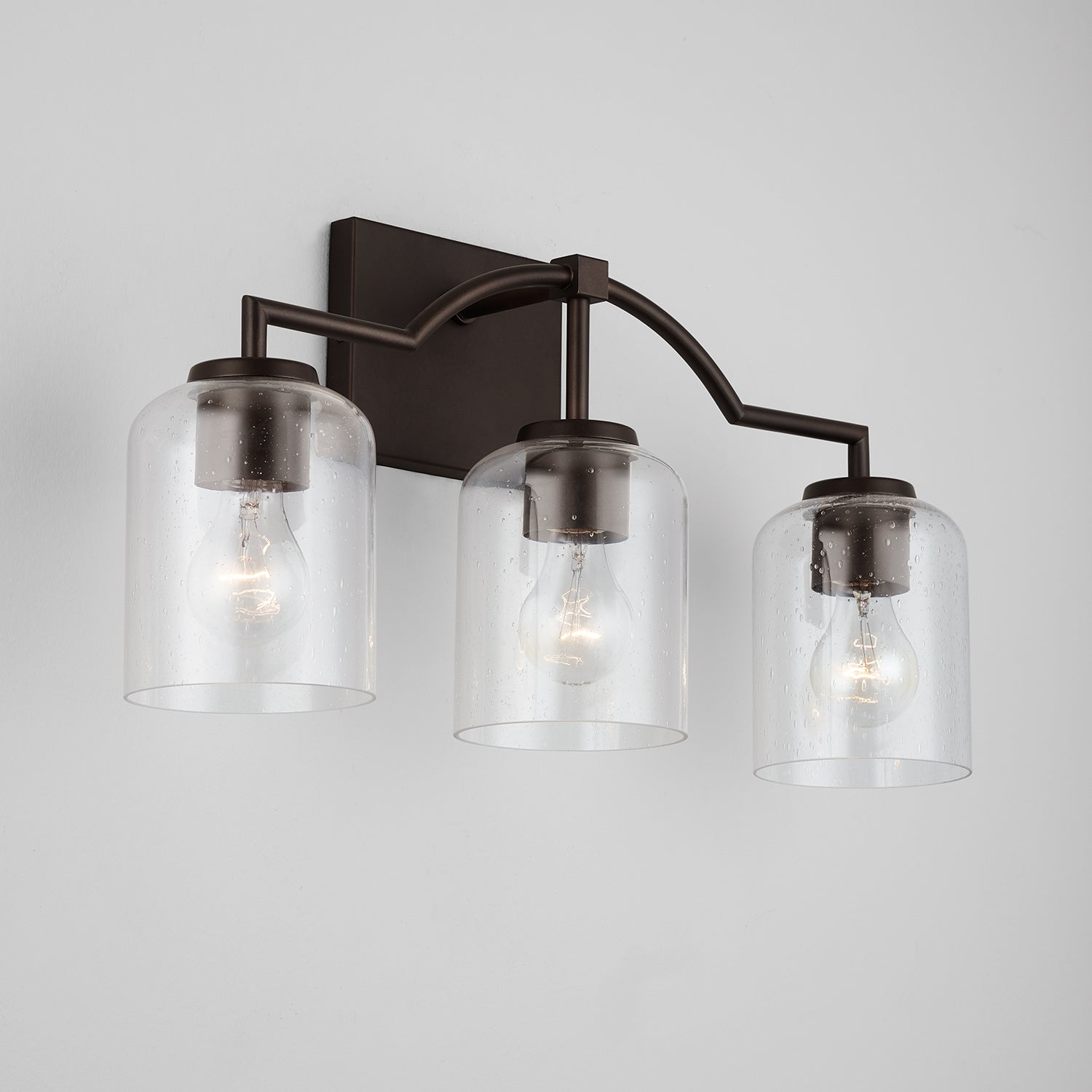 Carter 3-Light 22 in Bathroom Vanity Light with Clear Seedy Glass Shade