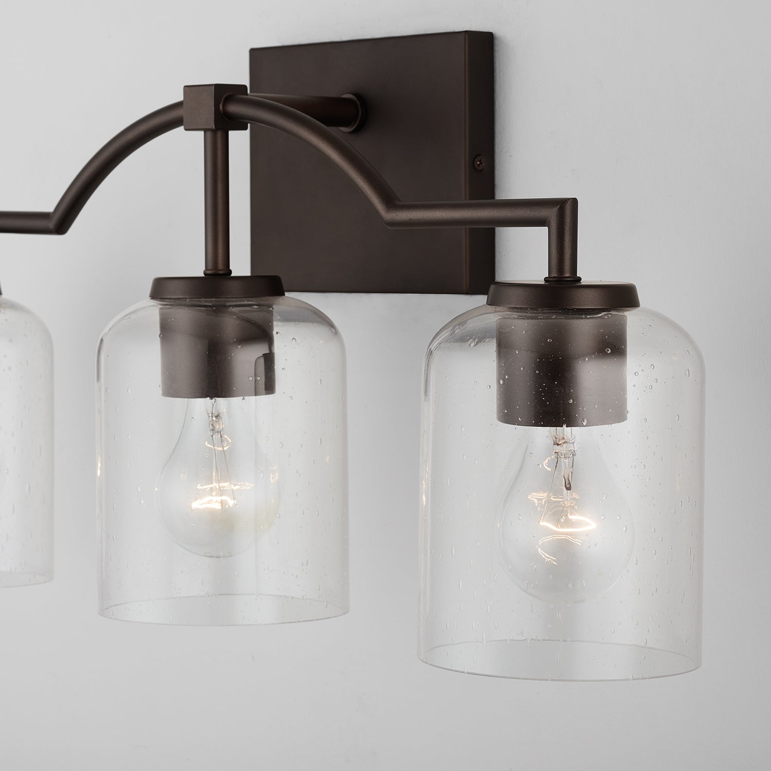 Carter 3-Light 22 in Bathroom Vanity Light with Clear Seedy Glass Shade