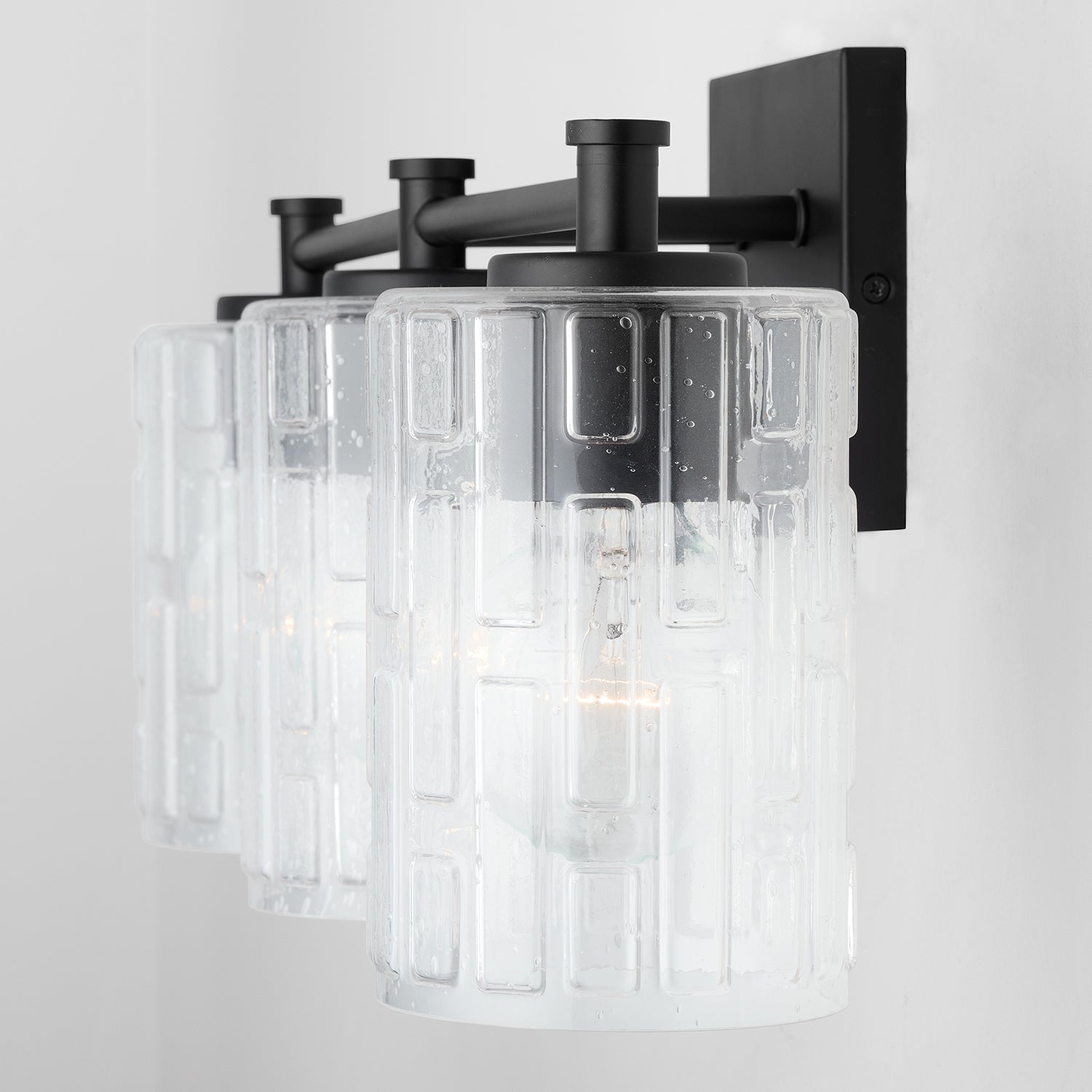 Emerson 3-Light 23 in Bathroom Vanity Light with Clear Textured Gass Shade