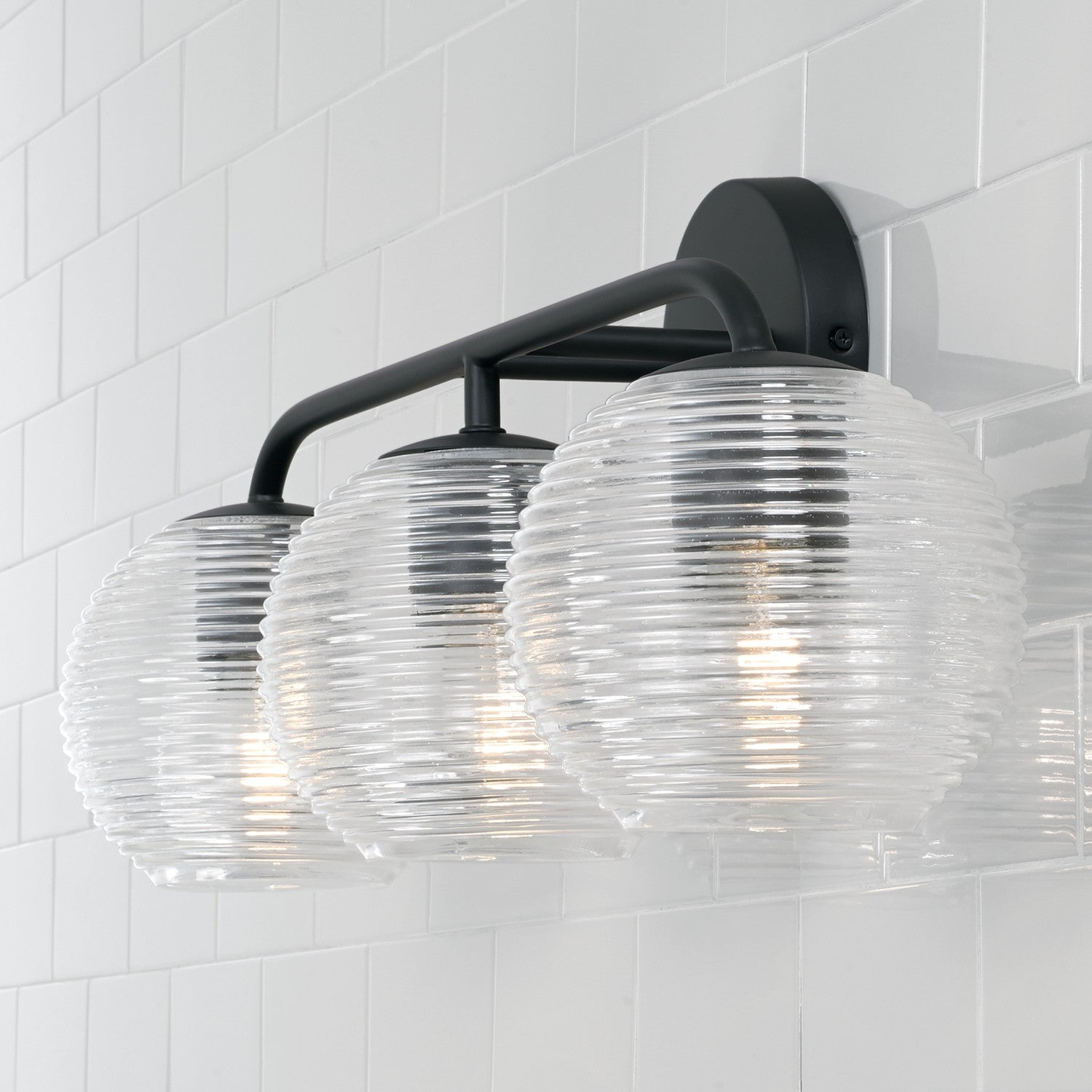 Dolan 3-Light 24-1/2 in Bathroom Vanity Light with Clear Ribbed Glass Shade