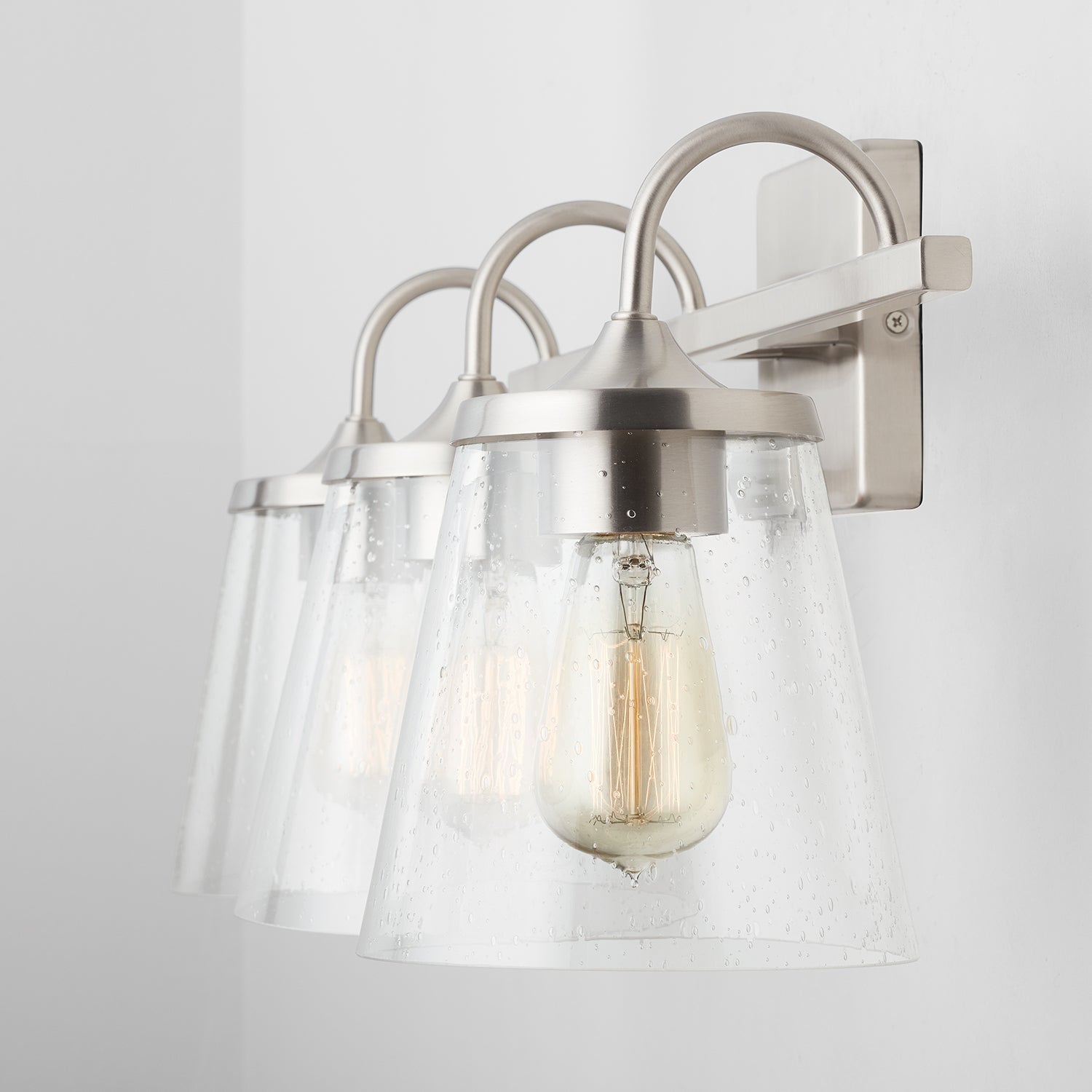 Jayne 3-Light 24-1/4 in Bathroom Vanity Light with Clear Seedy Glass Shade