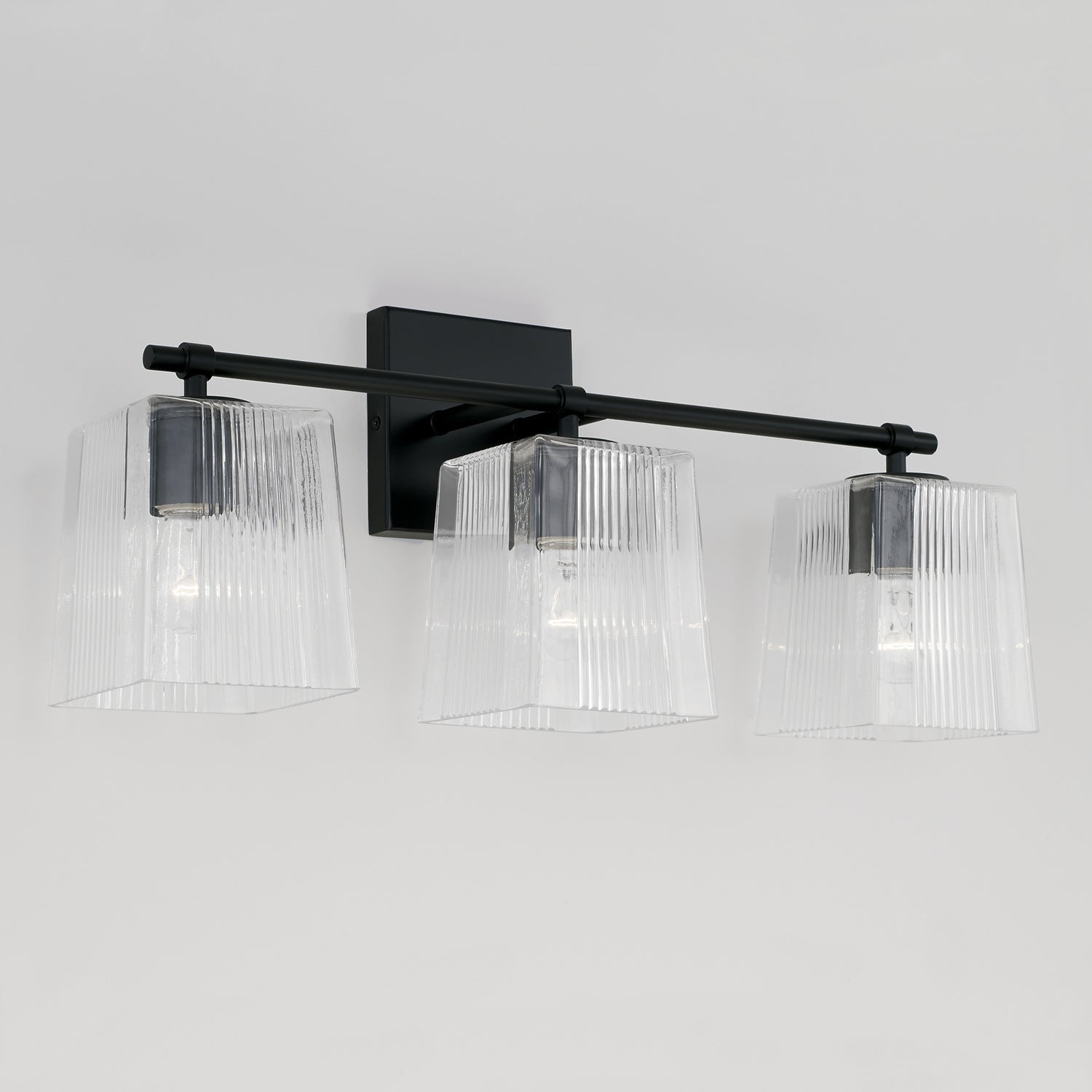 Lexi 3-Light Bathroom Vanity Light with Clear Textured Glass Shade