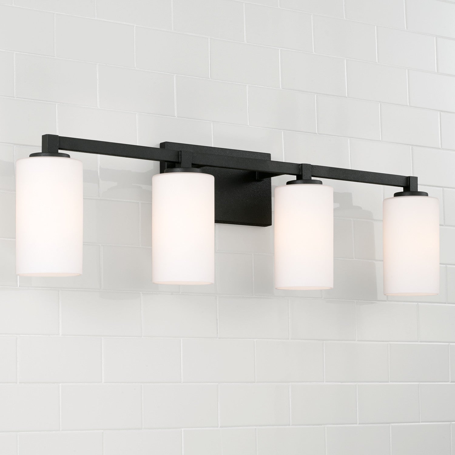 Ravenwood 4-Light 32-3/4 in Bathroom Vanity Light with Soft White Glass Shade