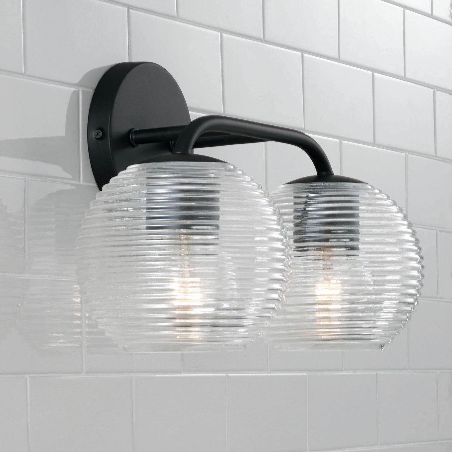 Dolan 2-Light Bathroom Vanity Light with Clear Textured Glass Shade