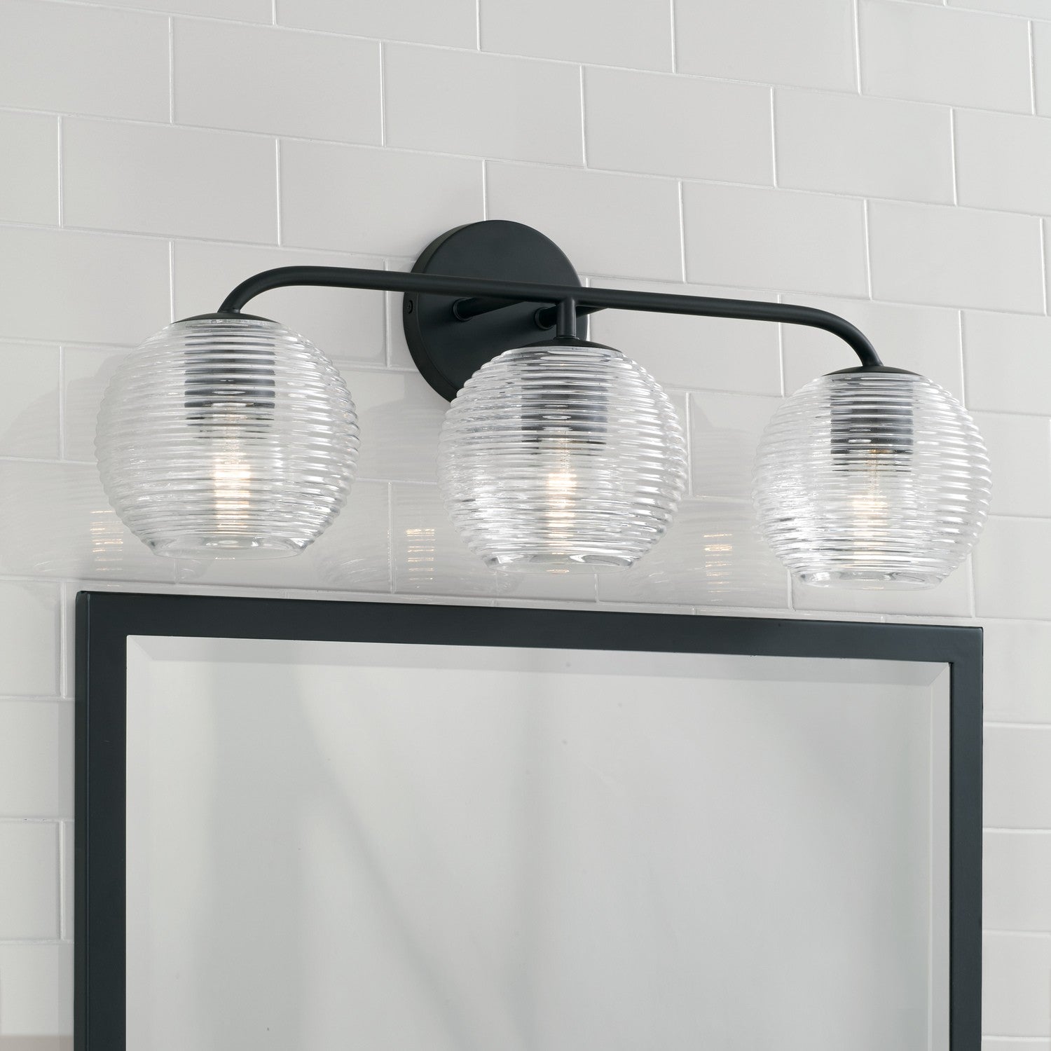 Dolan 3-Light 24-1/2 in Bathroom Vanity Light with Clear Ribbed Glass Shade