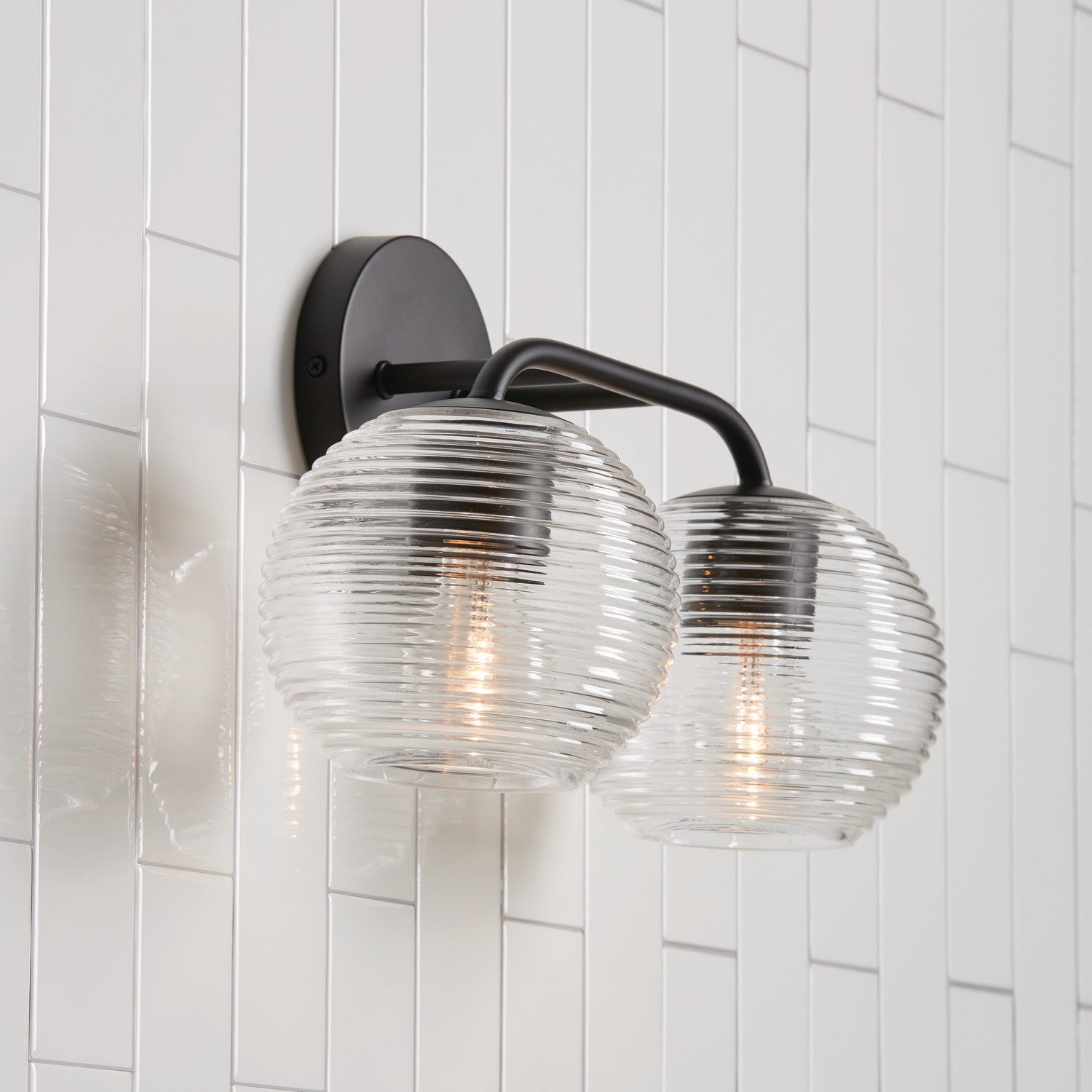 Dolan 2-Light Bathroom Vanity Light with Clear Textured Glass Shade