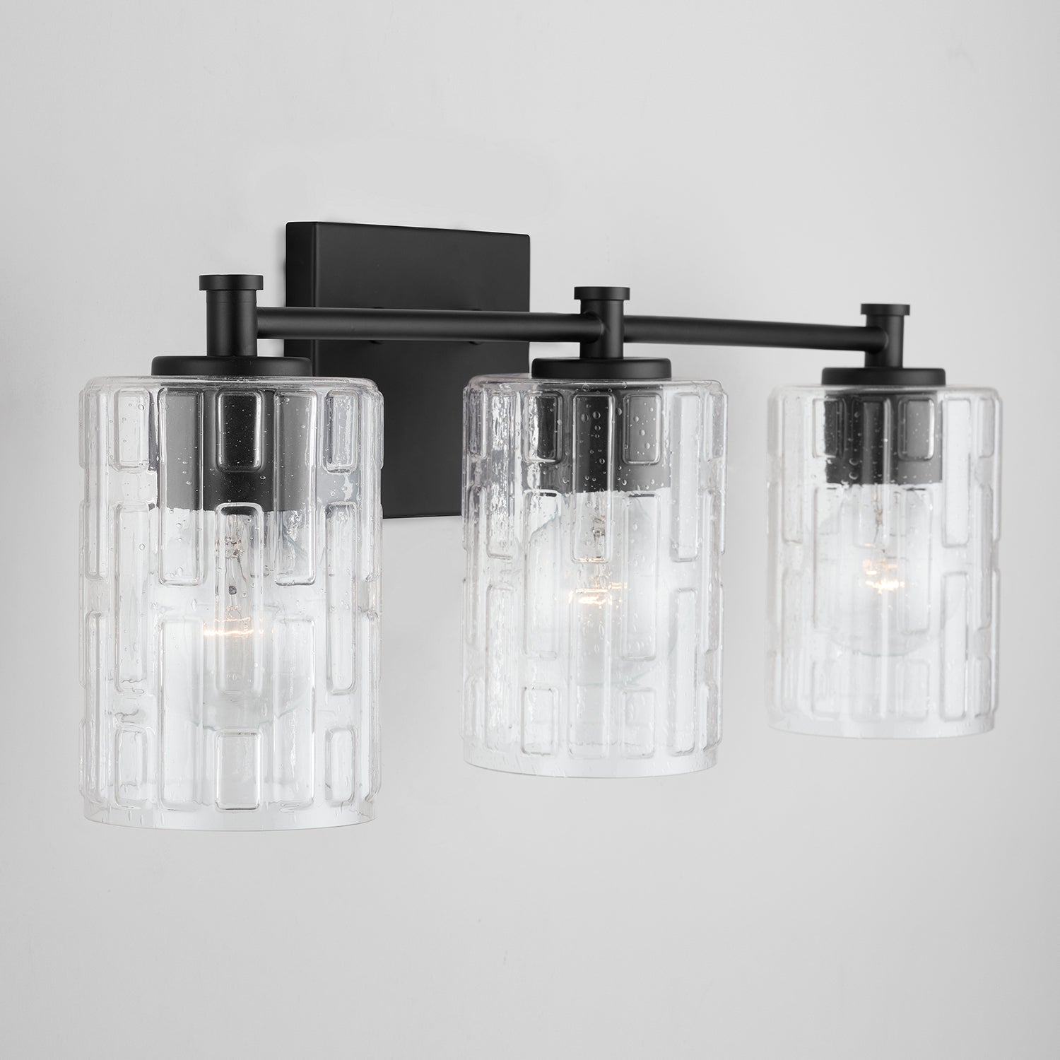 Emerson 3-Light 23 in Bathroom Vanity Light with Clear Textured Gass Shade