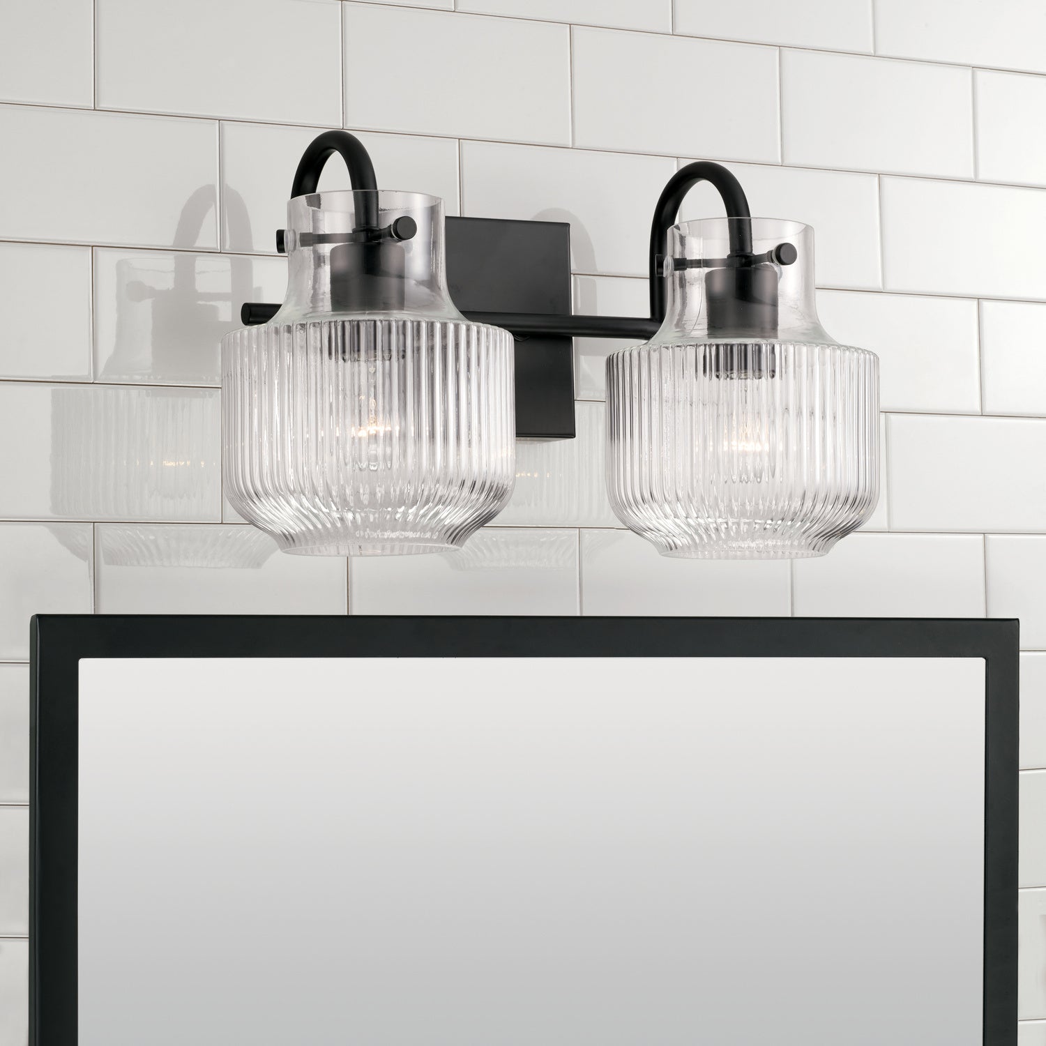 Nyla 2-Light Bathroom Vanity Light with Clear Textured Glass Shade