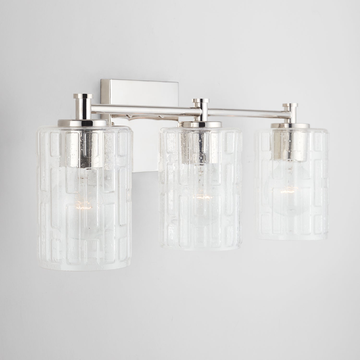 Emerson 3-Light 23 in Bathroom Vanity Light with Clear Textured Gass Shade