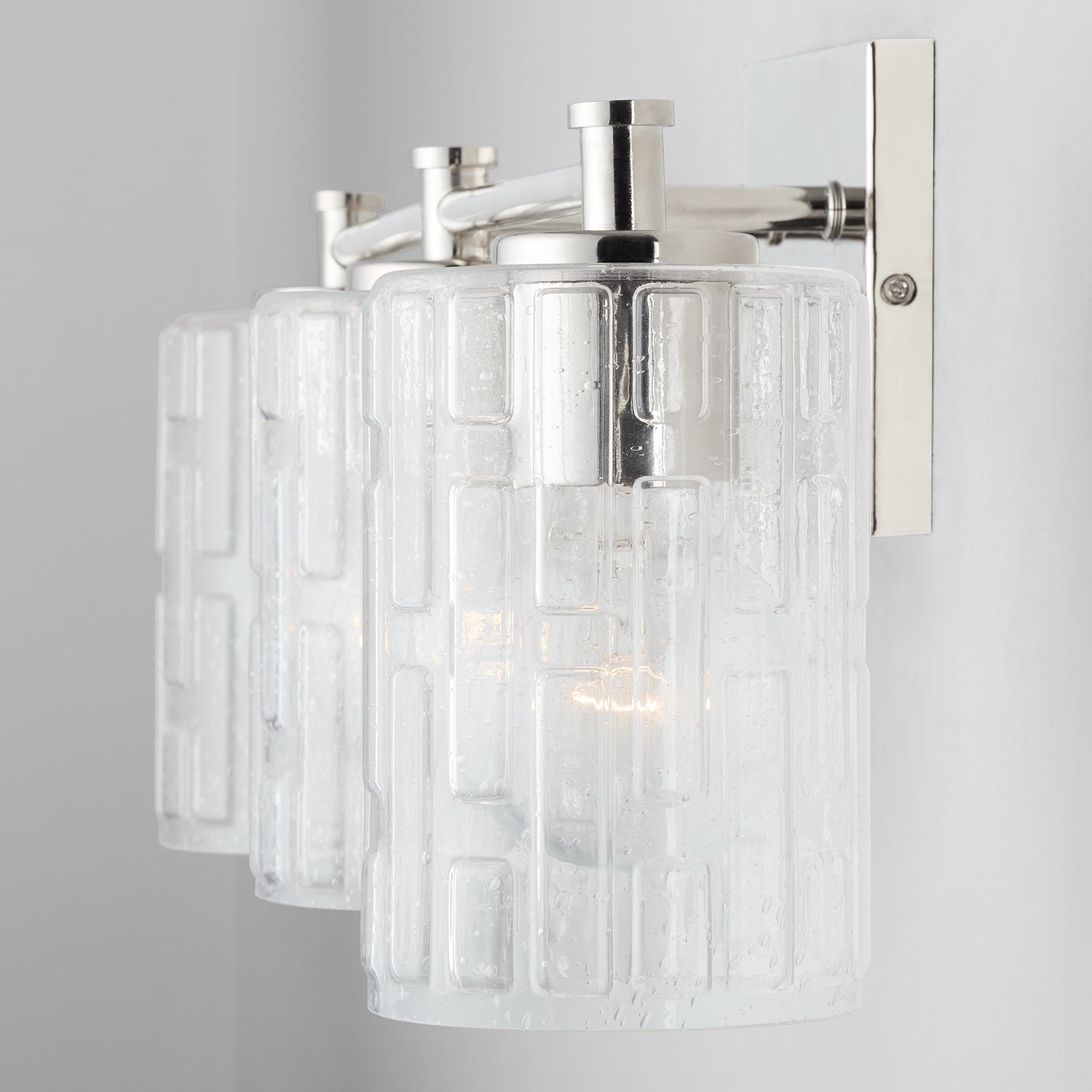Emerson 3-Light 23 in Bathroom Vanity Light with Clear Textured Gass Shade