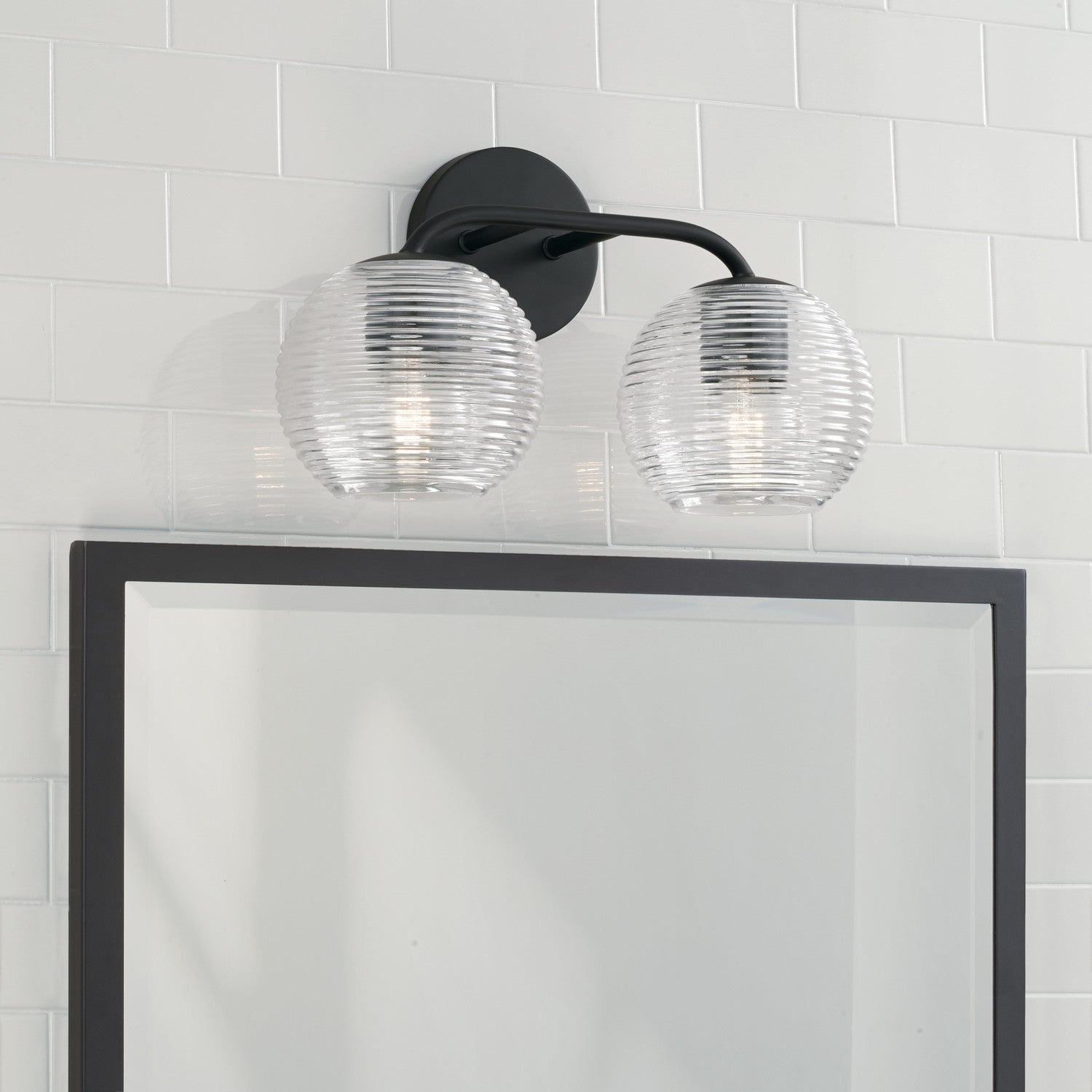 Dolan 2-Light Bathroom Vanity Light with Clear Textured Glass Shade