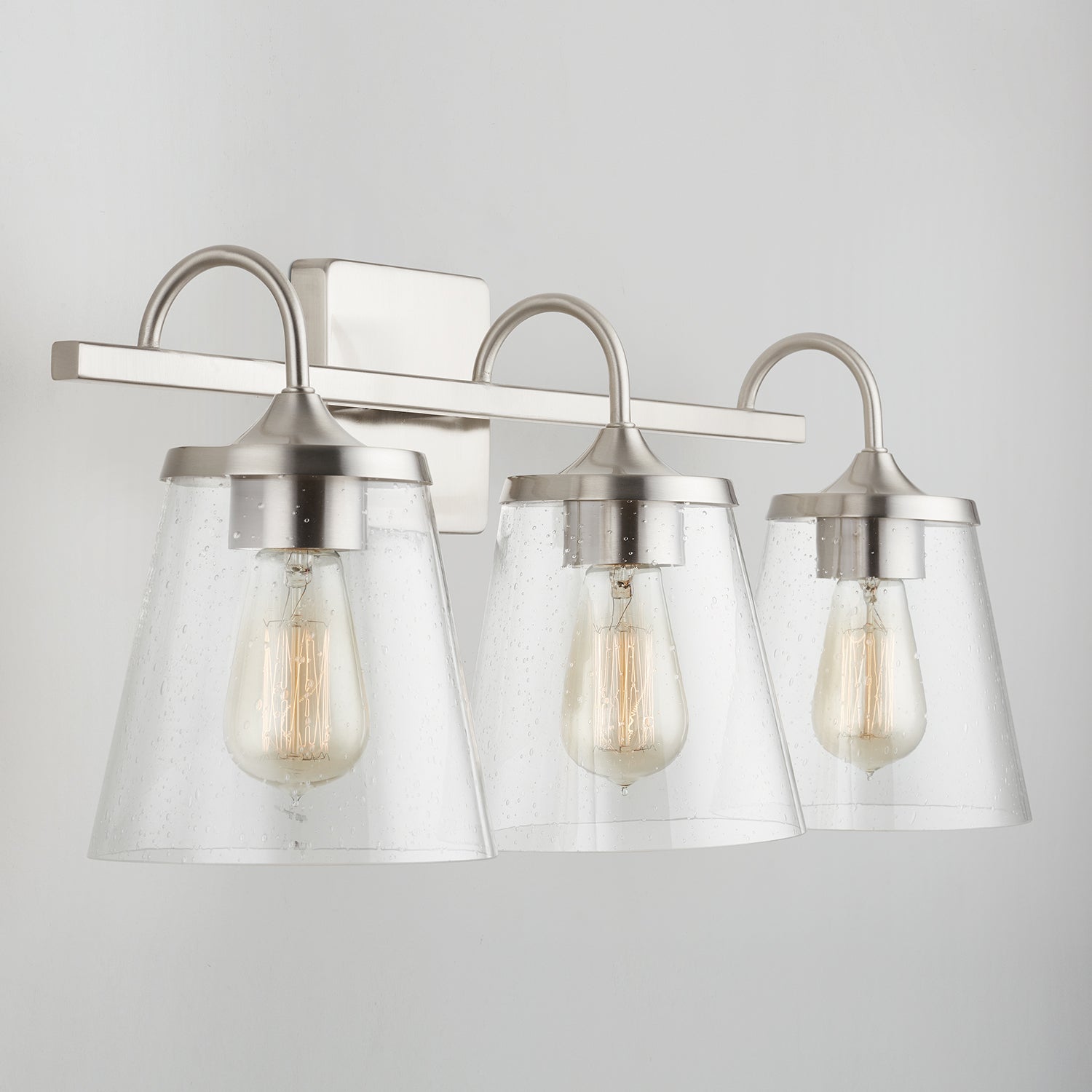 Jayne 3-Light 24-1/4 in Bathroom Vanity Light with Clear Seedy Glass Shade