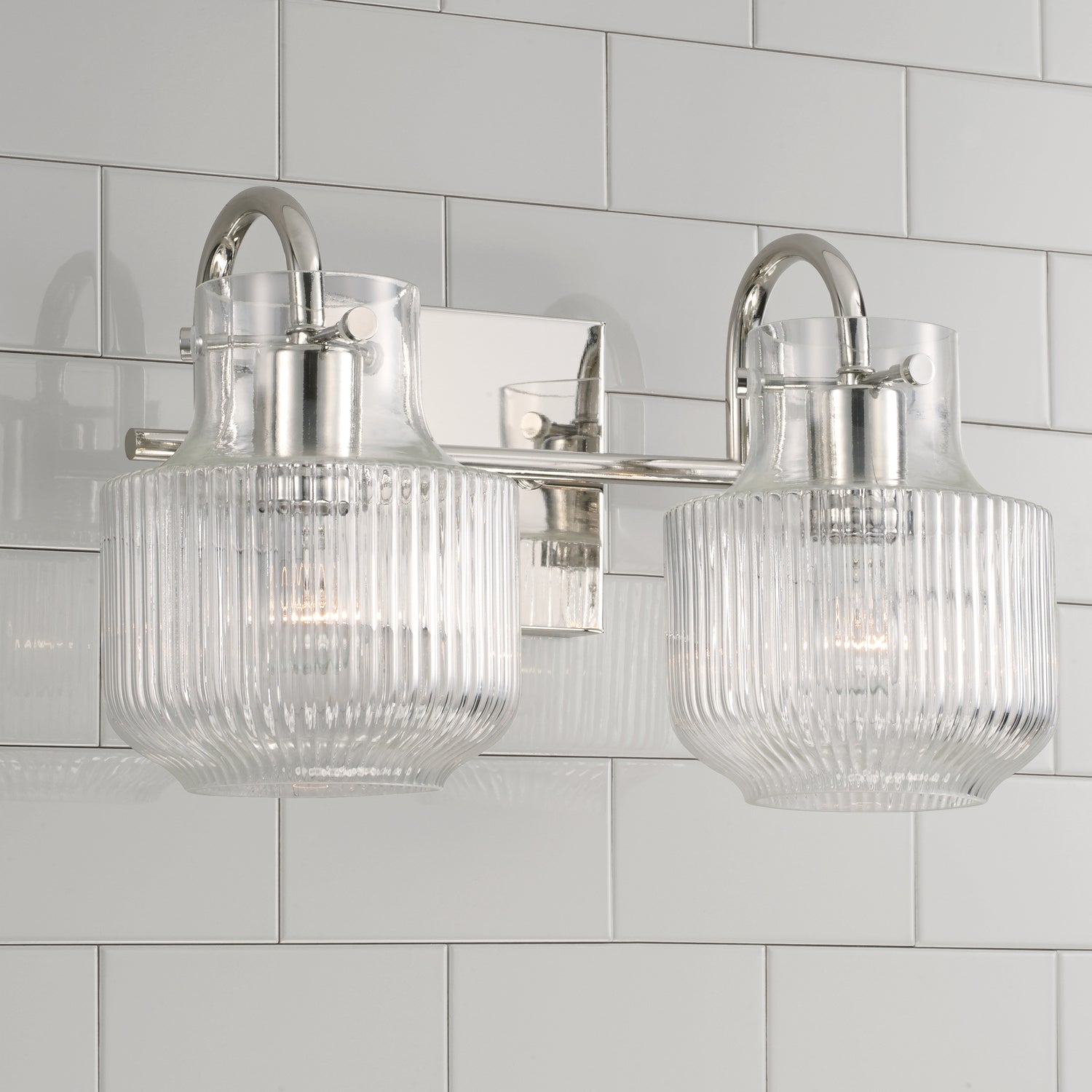 Nyla 2-Light Bathroom Vanity Light with Clear Textured Glass Shade